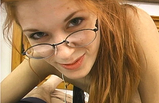 Redhead with Glasses